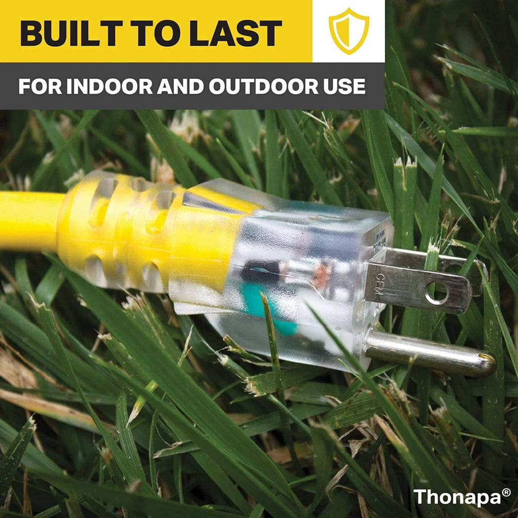 Yellow extension cord with clear 3-prong plug and illuminated outlet housing