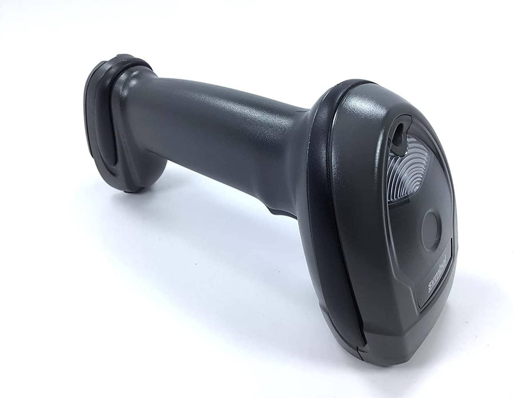 Wireless barcode scanner handset on cradle base, side profile