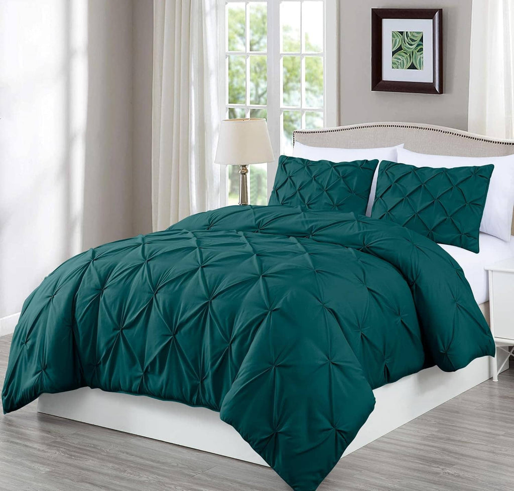 Teal king comforter set with diamond tufted quilting and two white-trim shams
