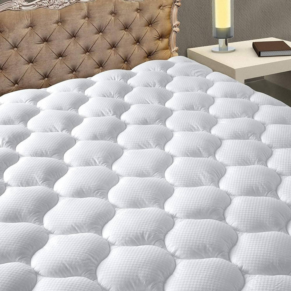 White quilted mattress pad with raised cloud-like bubbles, king size, plush top