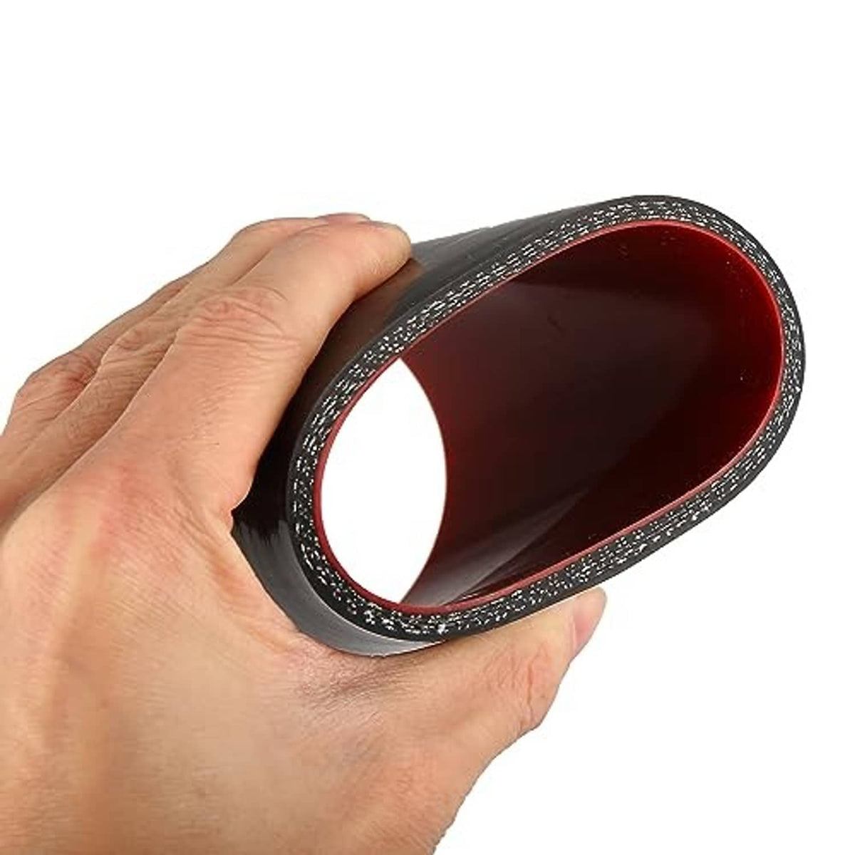Black silicone hose coupler held in hand, red-lined opening with stitched edge