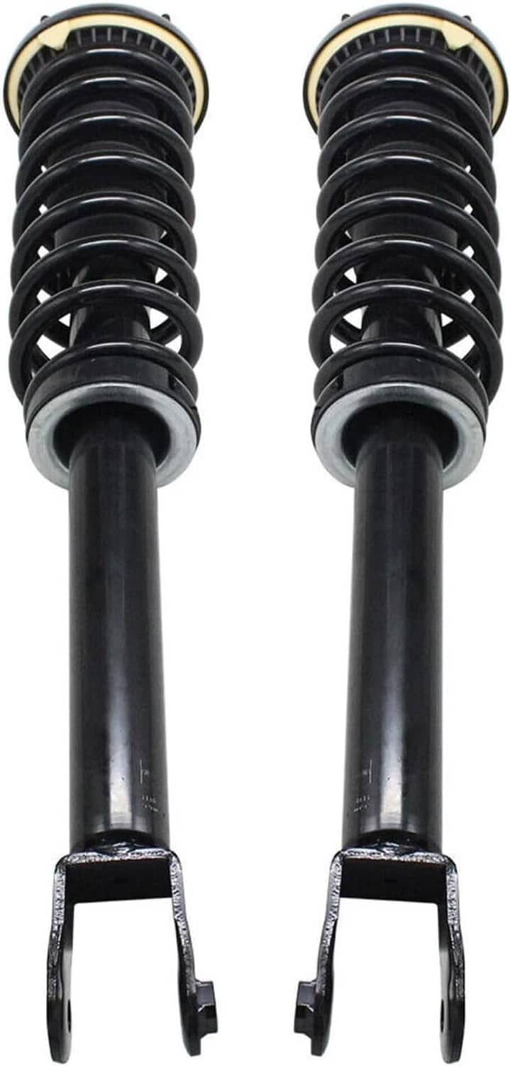 Pair of front shock struts with black coil springs, silver rod, and U-shaped forks