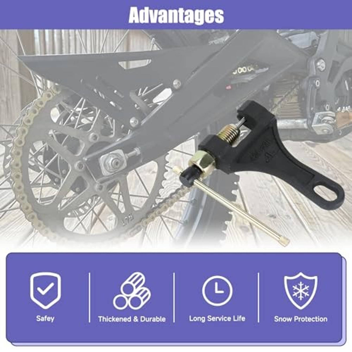 Motorcycle chain breaker tool positioned near a front wheel for chain repair