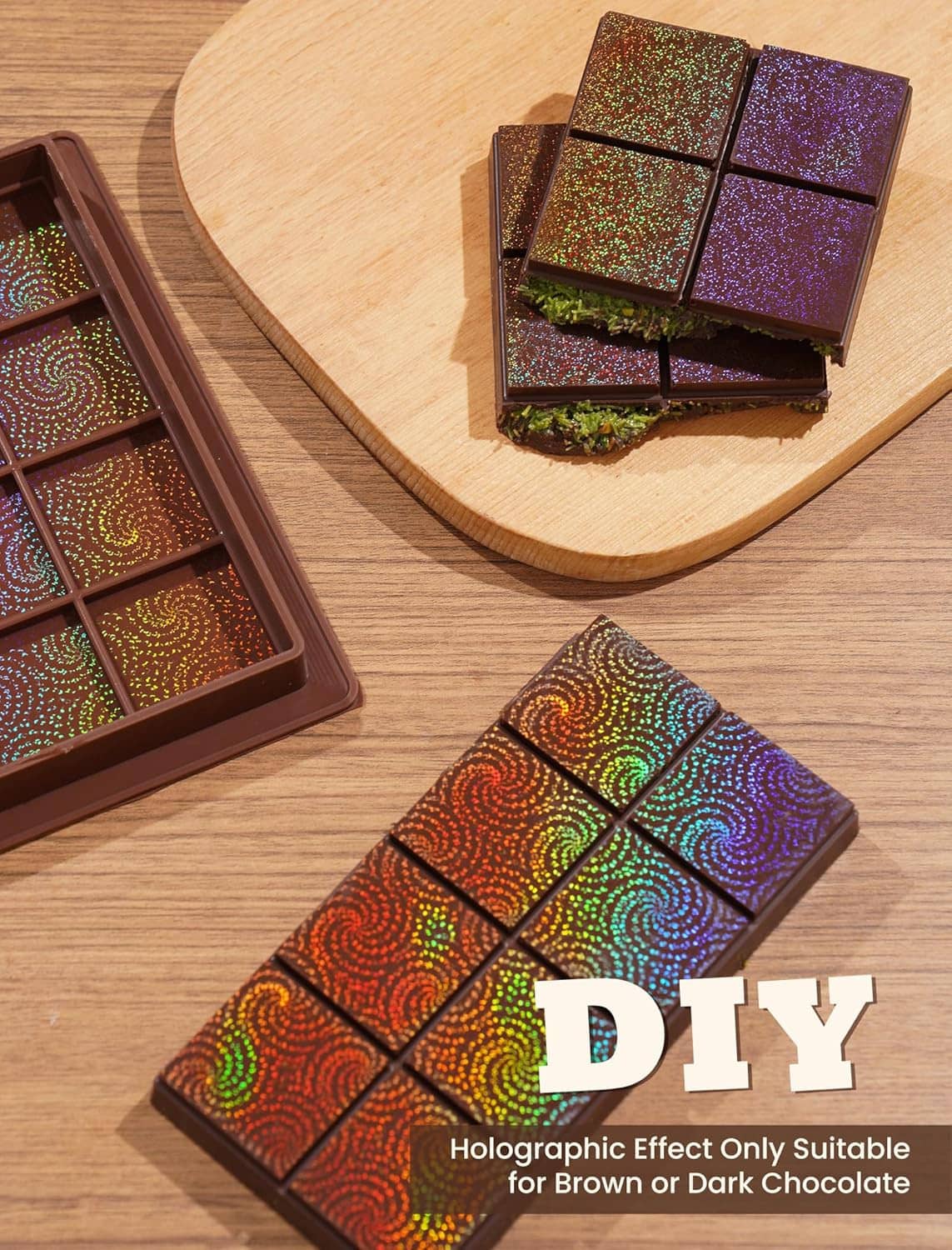 Chocolate pieces in a holographic swirl silicone mold on a wood board