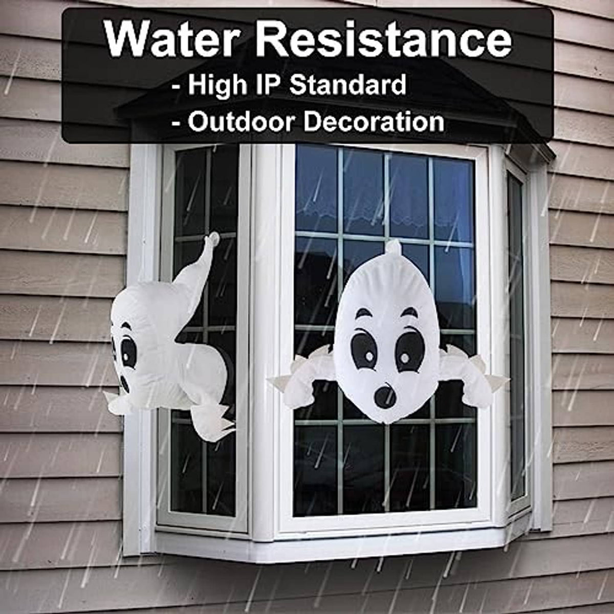 White Halloween stuffed ghost window decorations, two ghosts on window panes with long tails