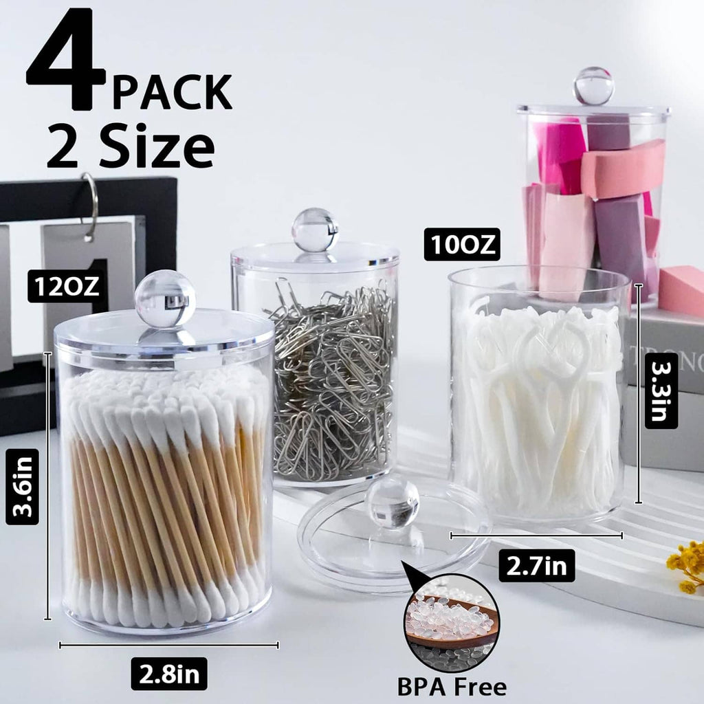 Set of clear apothecary jars with snap lids for cotton swabs, pads, and other bathroom items