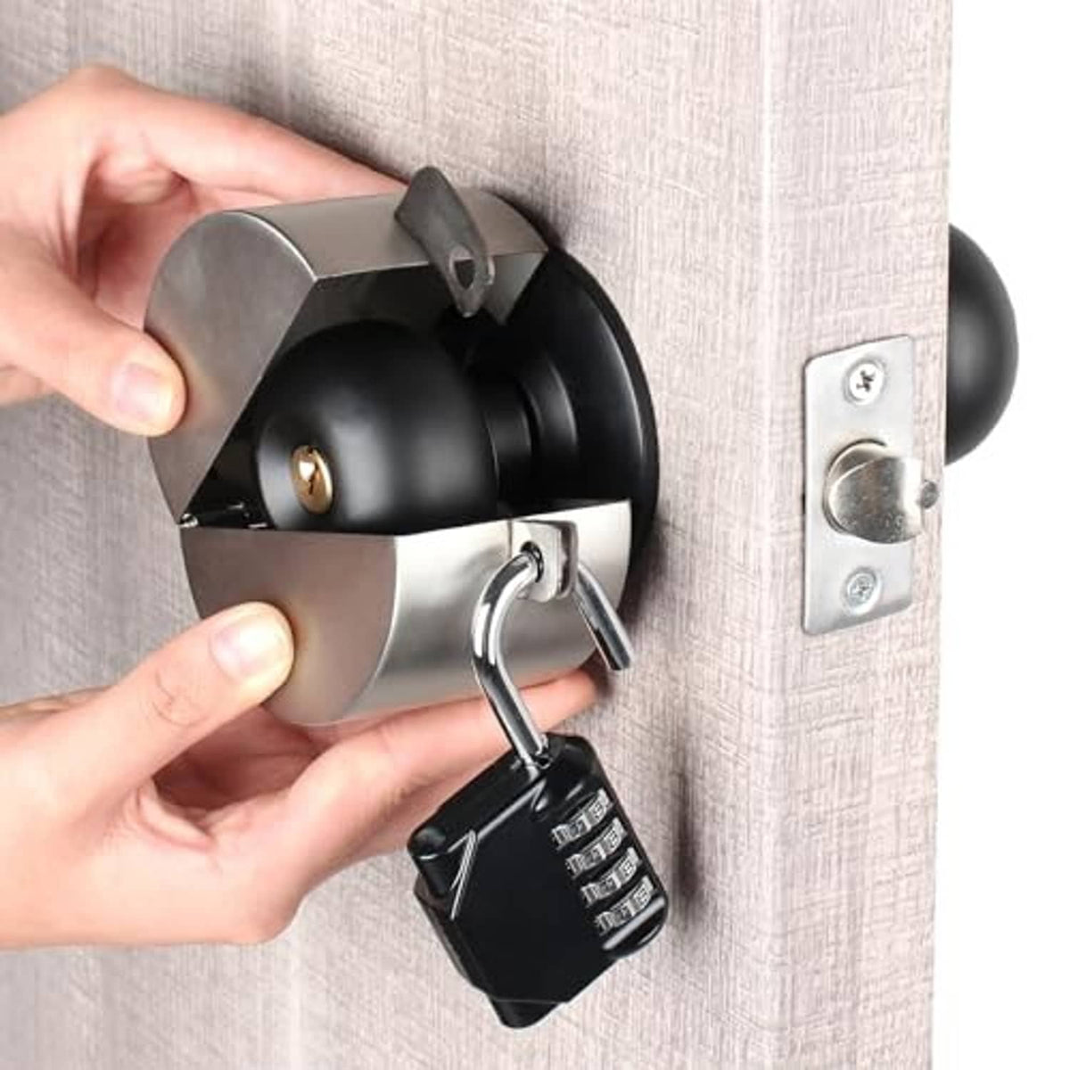 Door knob lock with black keypad and metal housing, mounted on a door handle