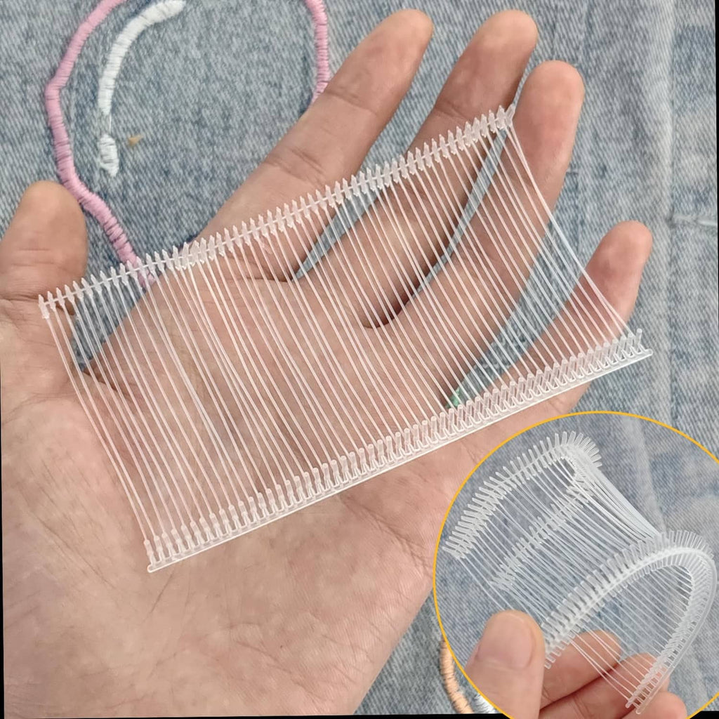 Hand holding tag fastener strip with white metal prongs for attaching tags
