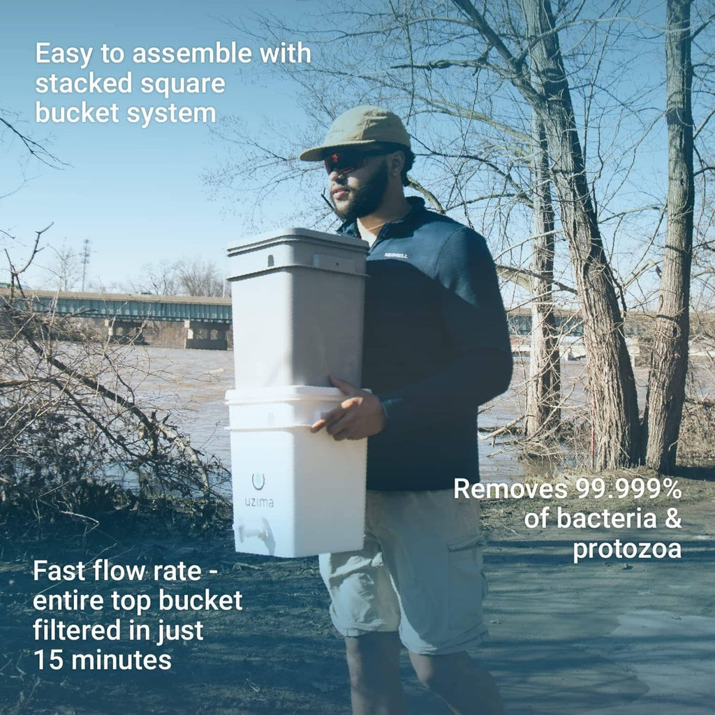 Portable water filter system with white bucket and outlet spigot for filtered water