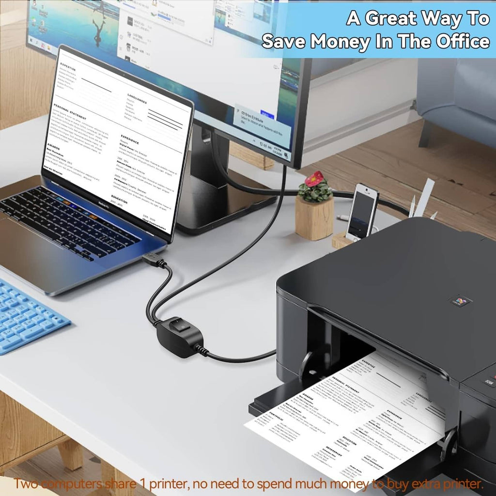 USB splitter switch connecting two laptops to a printer with black cable leads