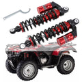 Front ATV shocks set with red-and-black coil springs and mounting hardware wrench
