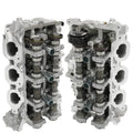Driver and passenger cylinder head assembly pair with rocker arms and valves, silver/black