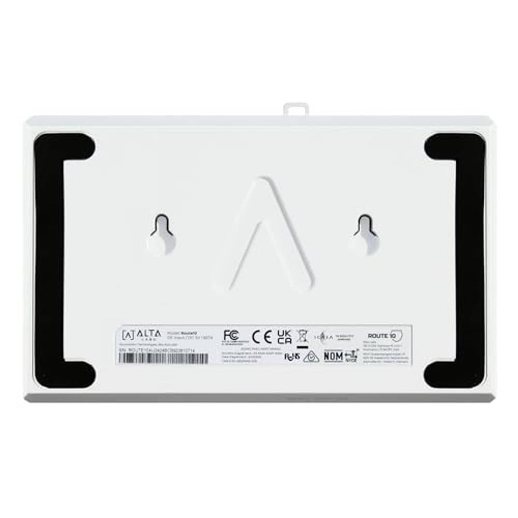 White multi-WAN router rear with wall-mount brackets and label area