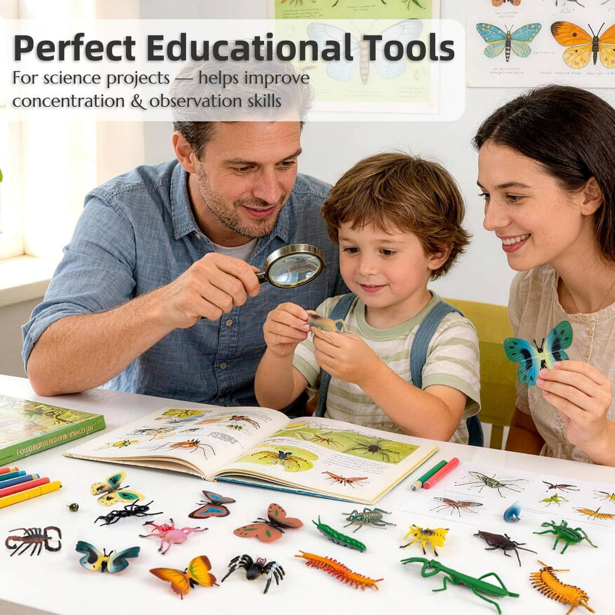 Plastic bug toy set on activity table with magnifying glass and children