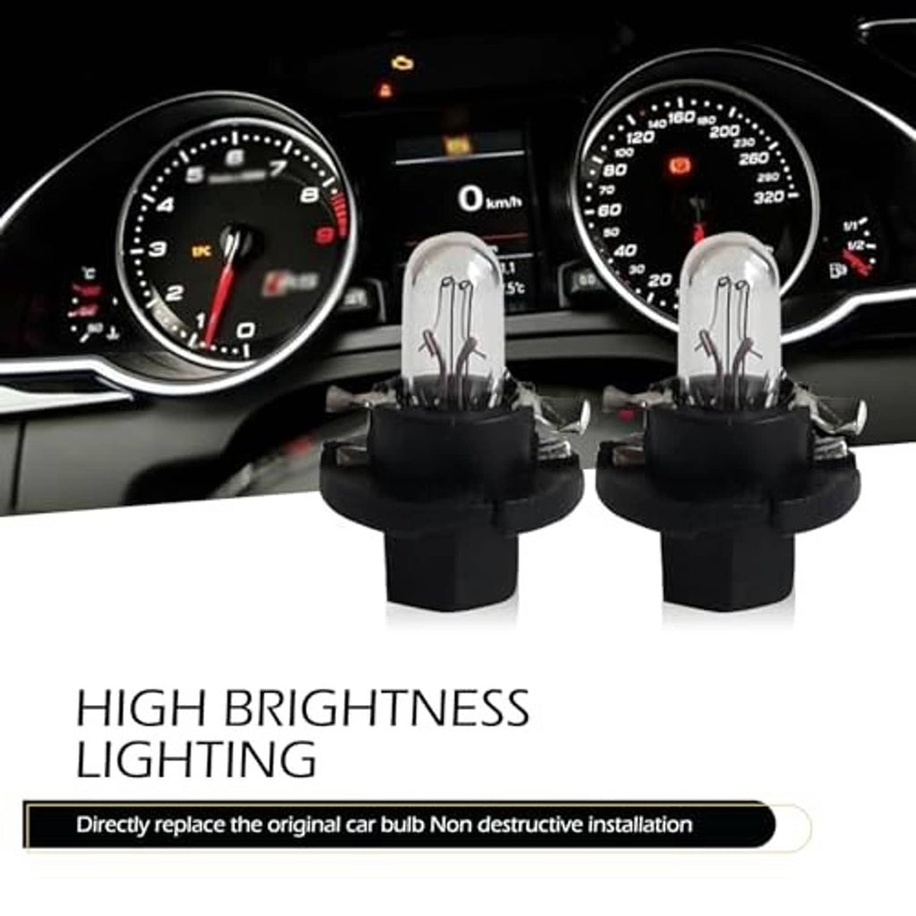 Two T5 car dashboard bulbs with clear glass and black base on an instrument panel