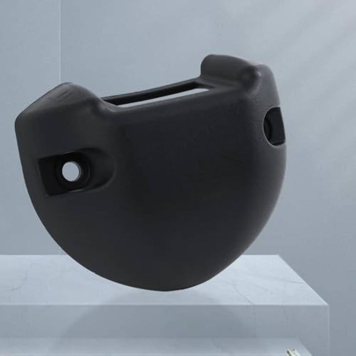 Black rocker switch base cover corner view with side mounting hole and raised handle