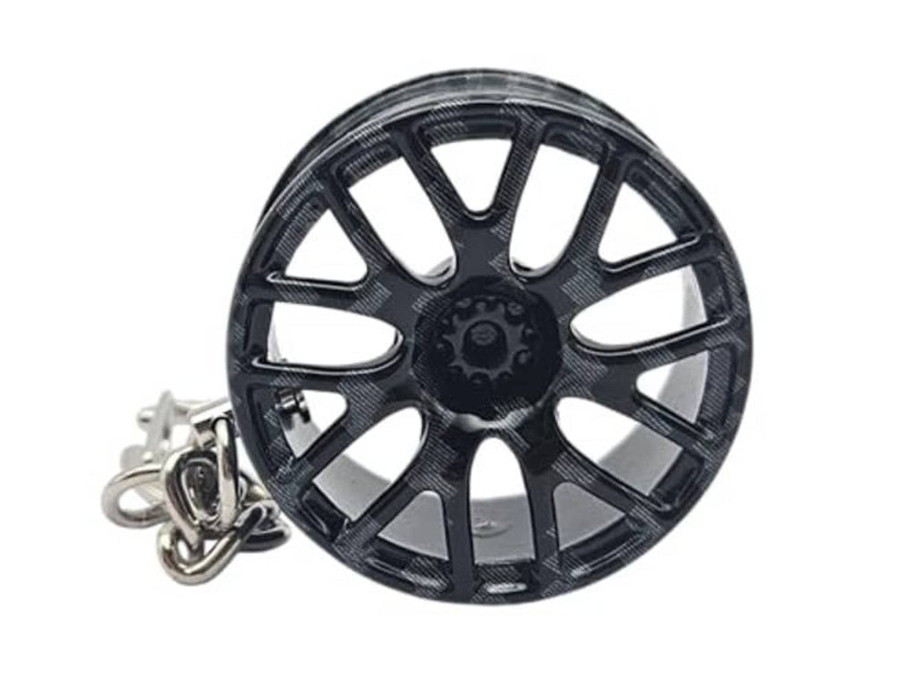 Carbon-fiber style wheel keychain with silver clasp and key ring