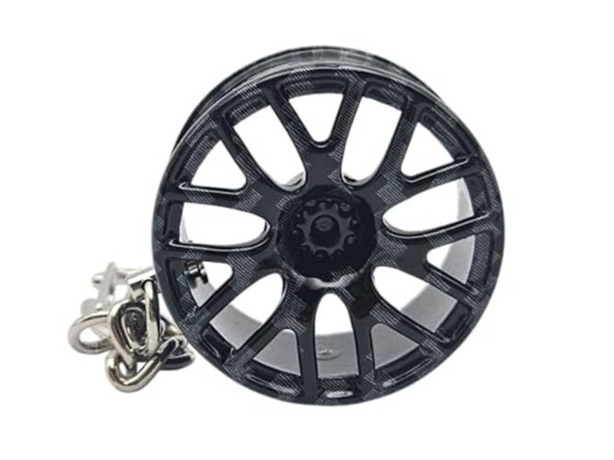 Carbon-fiber style wheel keychain with silver clasp and key ring