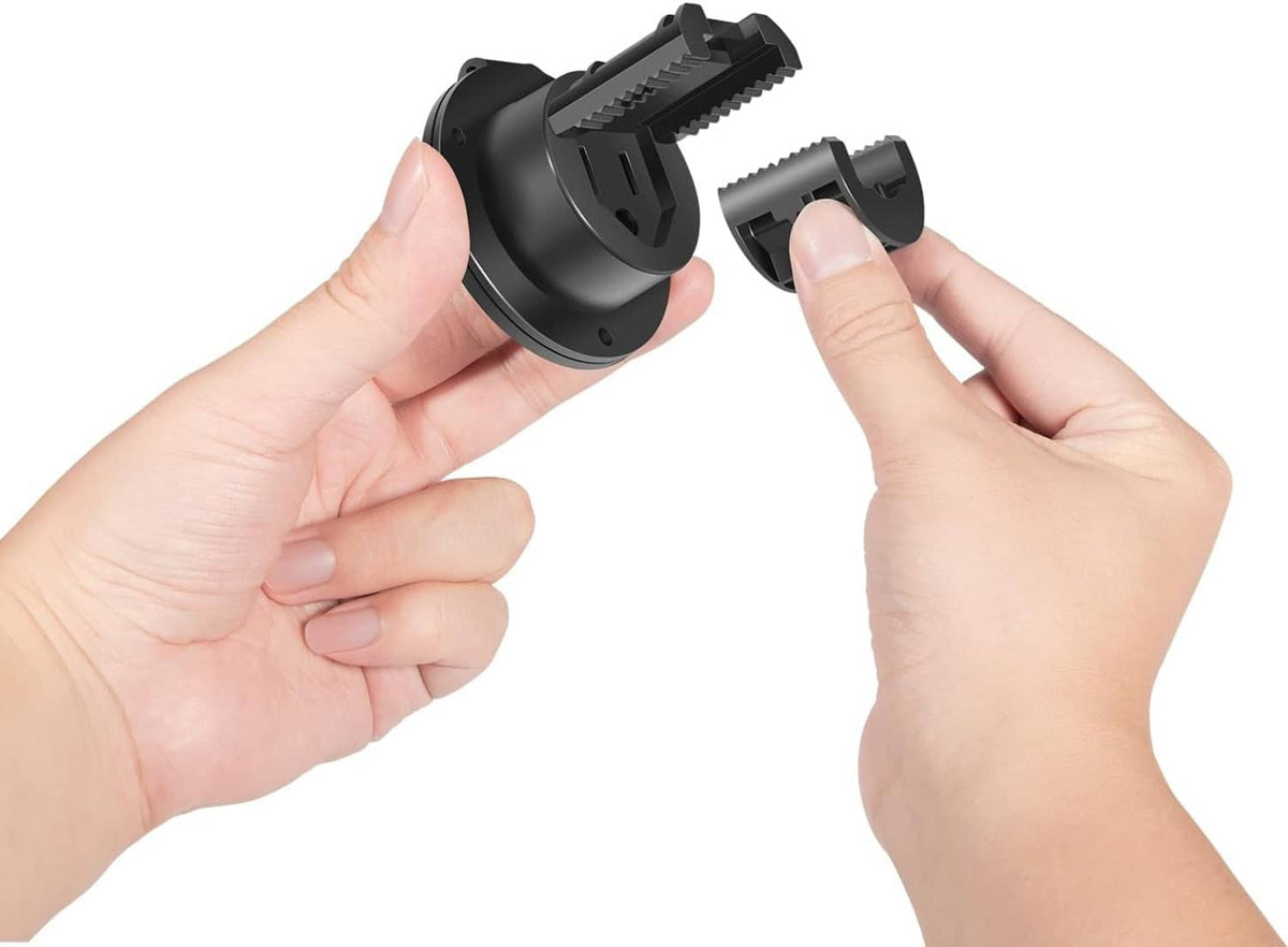 Hands installing black AC power port cover and plug into mounting base