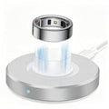 Metal fast-charging dock with ring holder cradle, circular base and indicator light