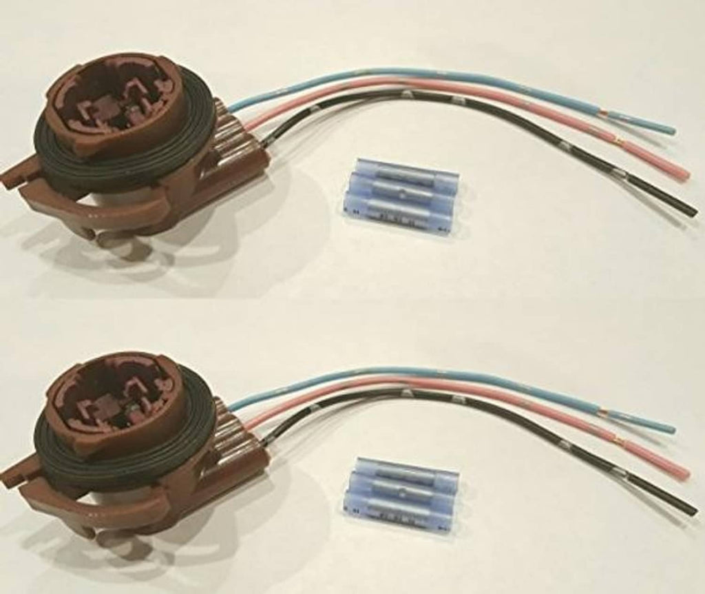 Two light socket pigtail repair kits with brown housings, blue terminal blocks, and colored leads