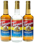 Torani coffee syrup variety pack with caramel, vanilla, and hazelnut bottles, gold caps