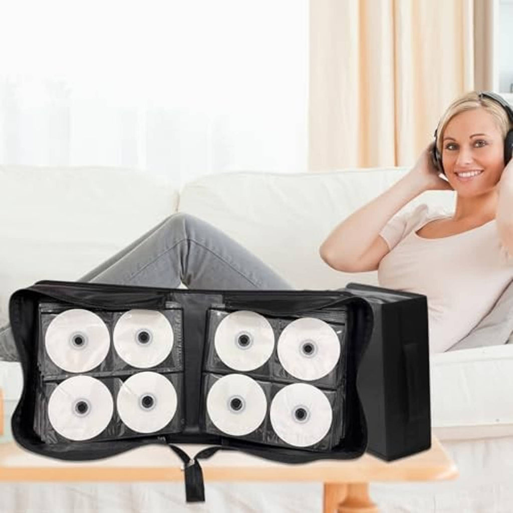 Black disc storage binder holding multiple CDs in grid pockets