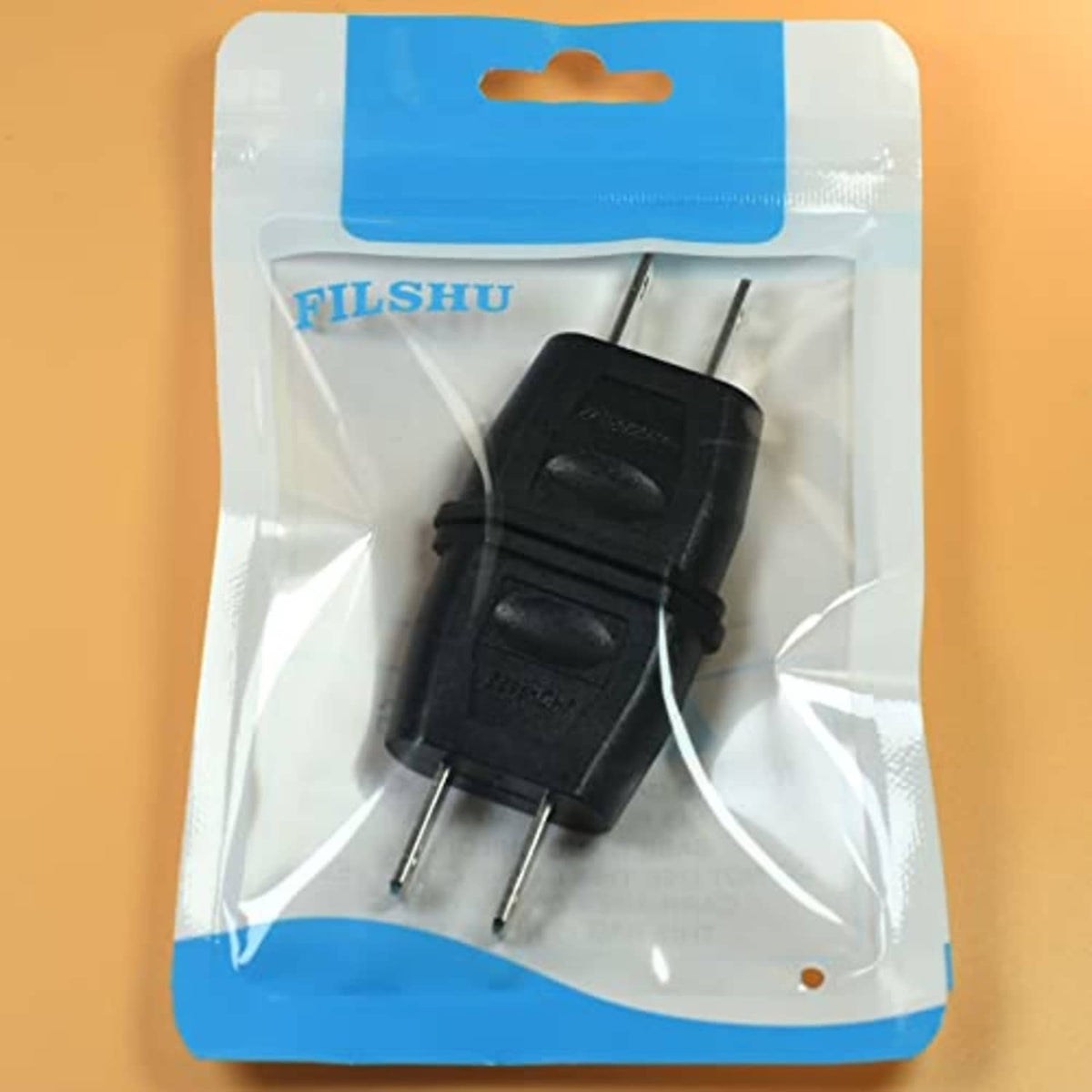 FILSHU black travel plug adapter in clear blister pack, two-pin EU to US