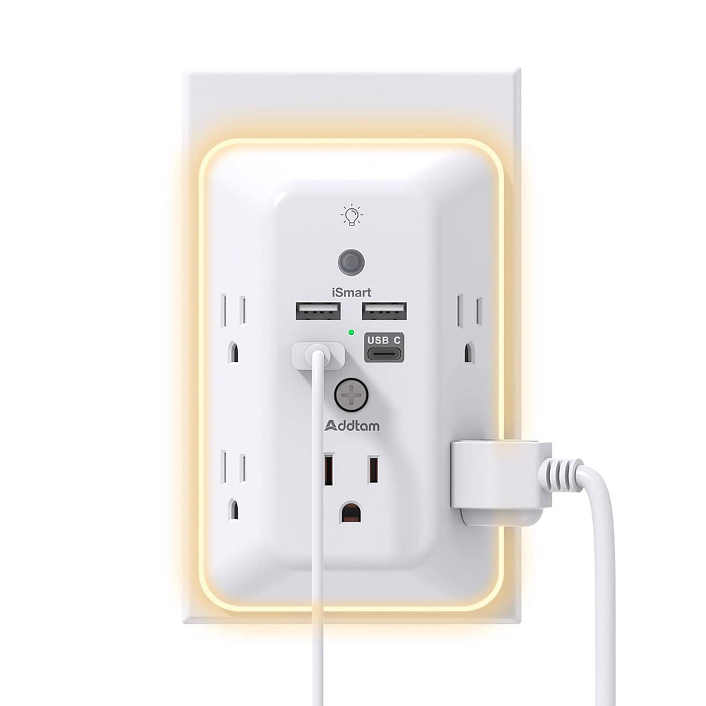 White outlet extender with multiple outlets and USB ports, featuring built-in night light