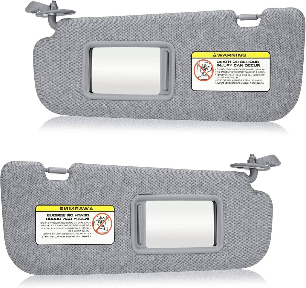 Pair of gray sun visors with rectangular mirror openings and attached mounting hardware