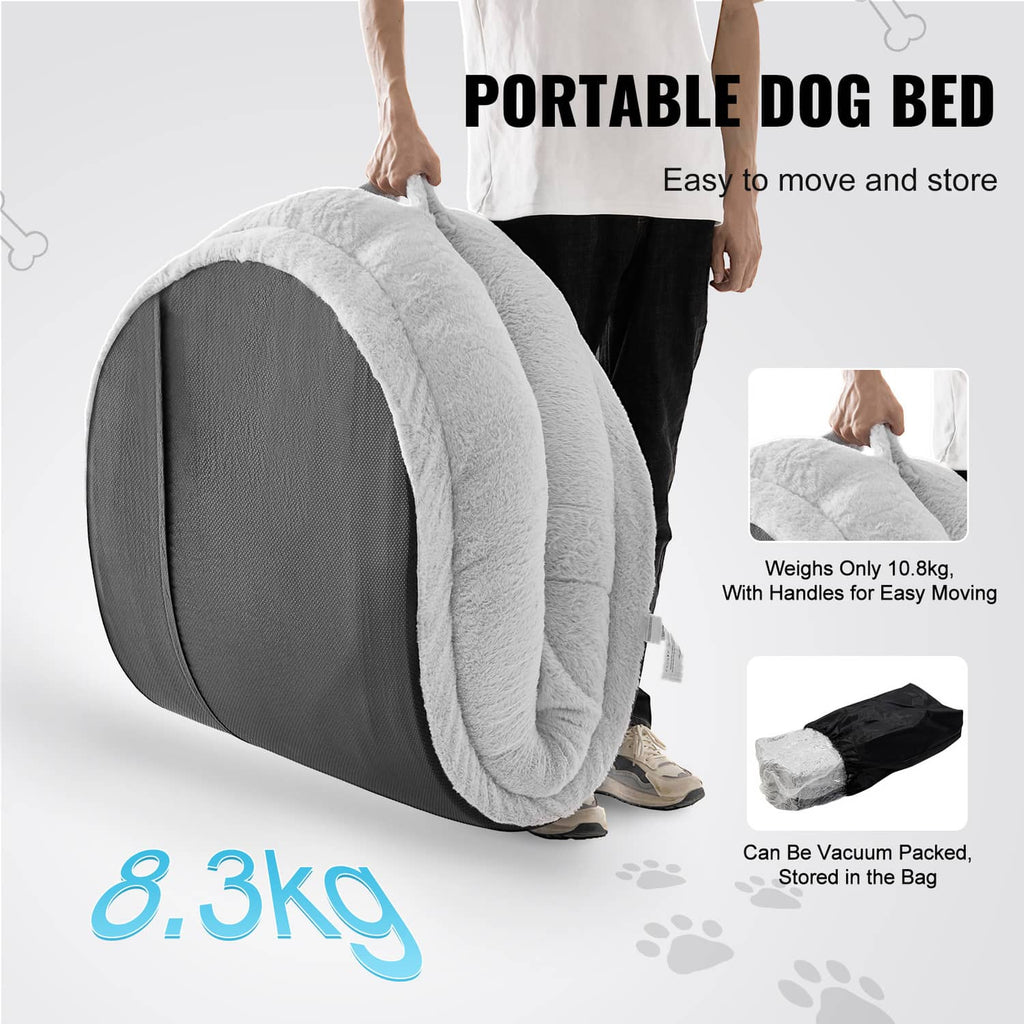 Portable grey oval dog bed folded for easy moving, plush outer bolster.