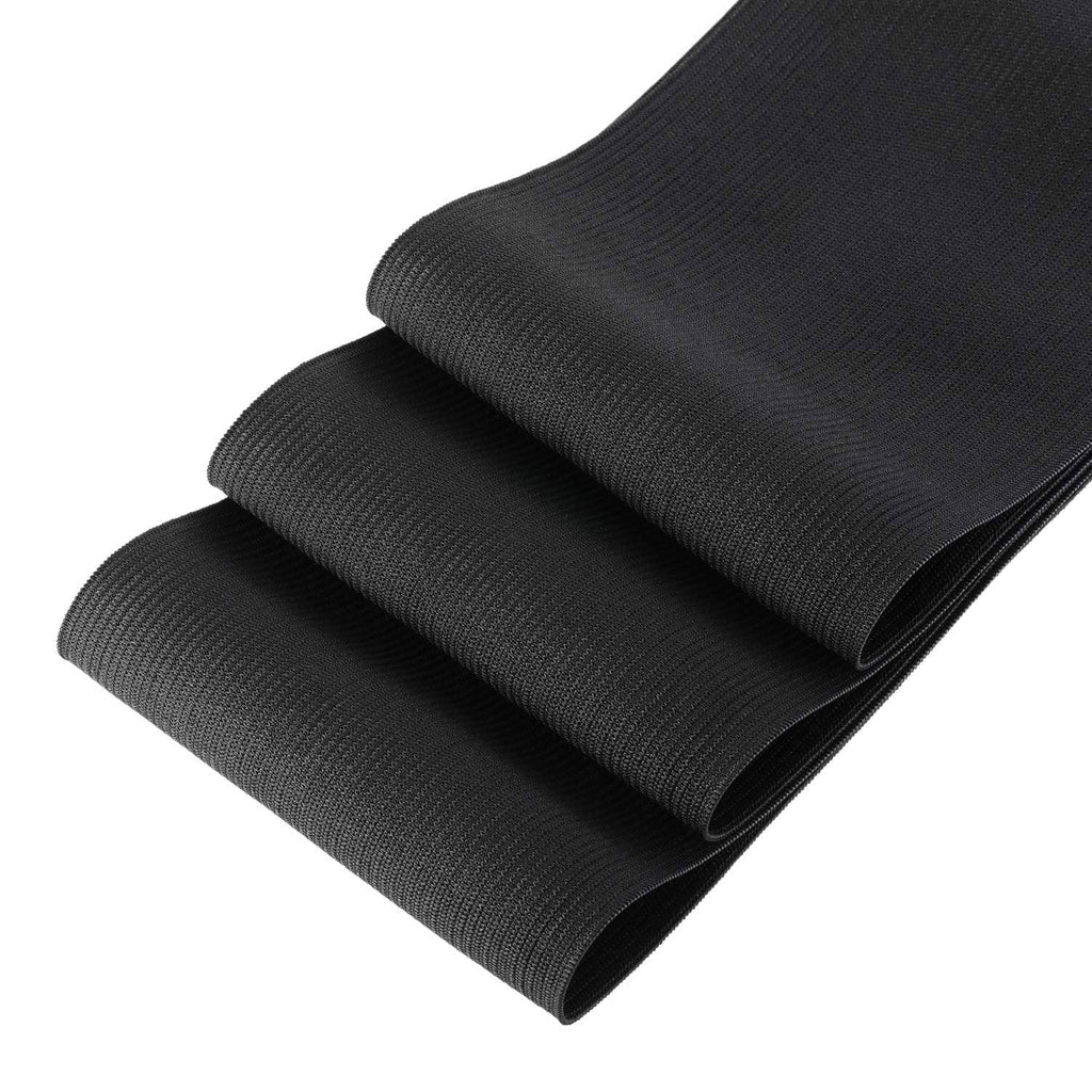 Stack of black elastic rolls, neatly bundled