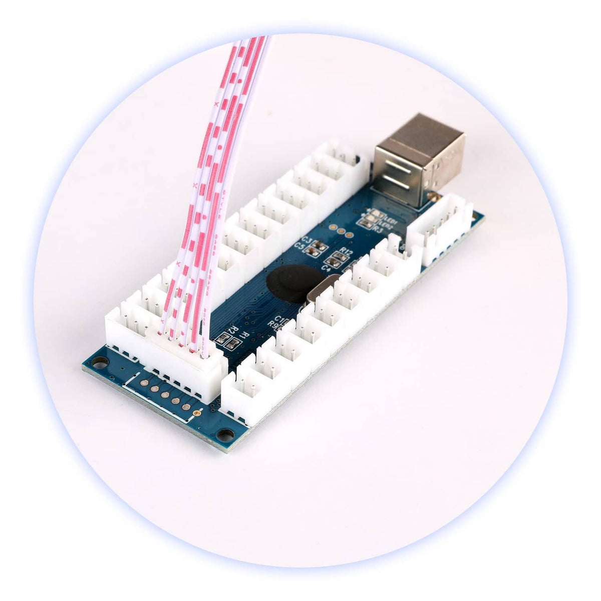 USB encoder board with metal USB port, blue PCB, and white 5-pin connector header