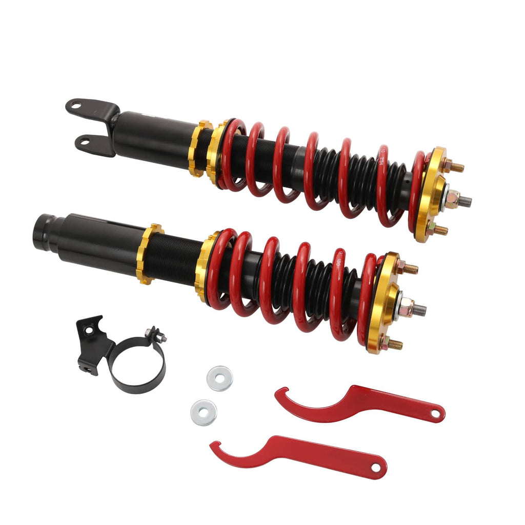 Coilover struts with red springs and gold mounts, plus black clamp bracket parts and red levers.