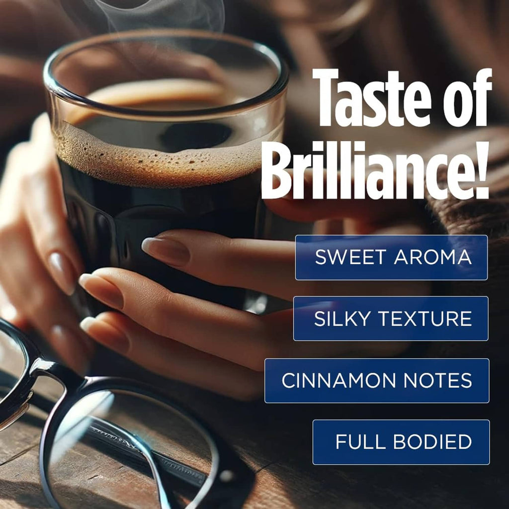 Glass cup of dark instant coffee with crema foam, close-up with a hand