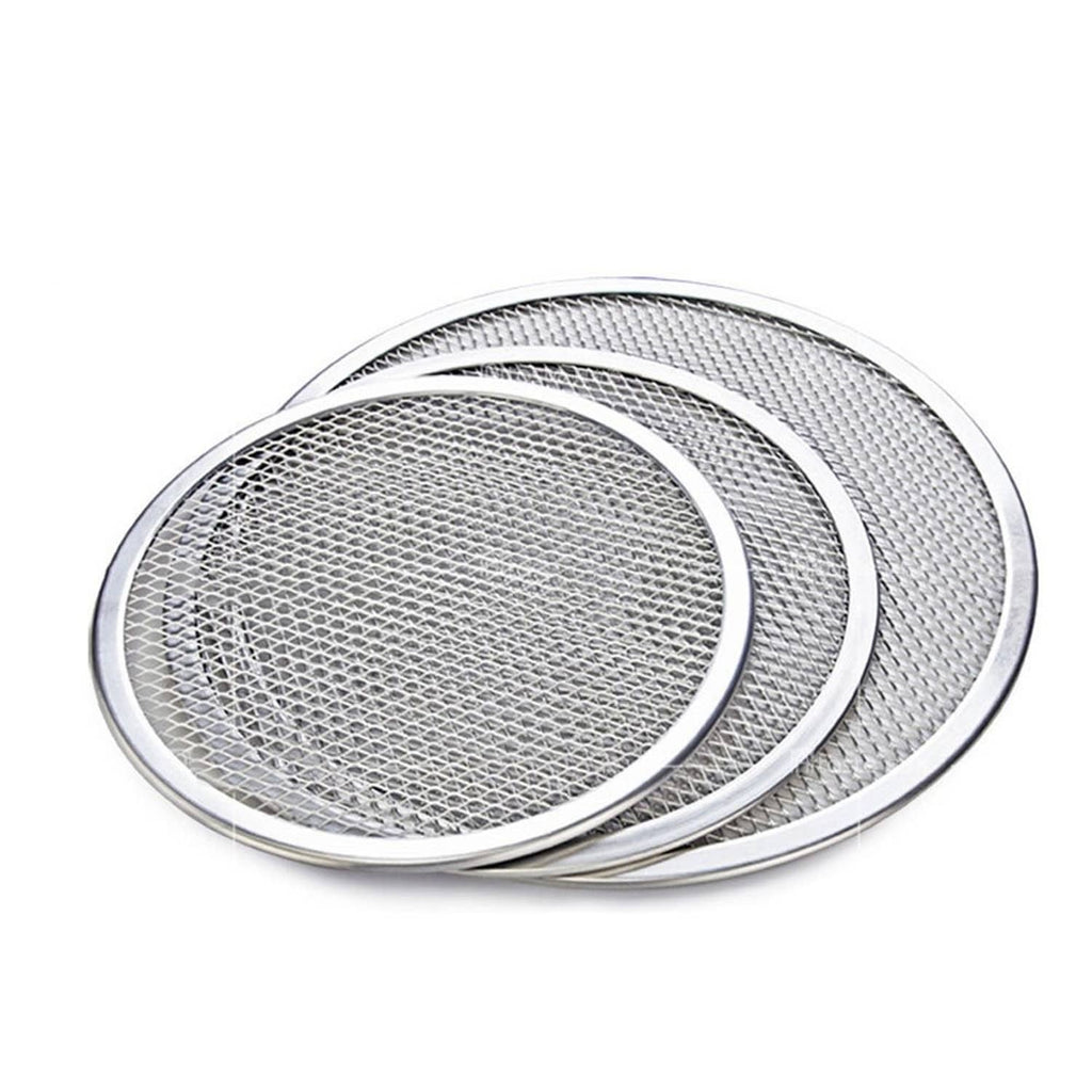 Stack of round aluminum pizza pans with textured mesh base and smooth seamless rim.