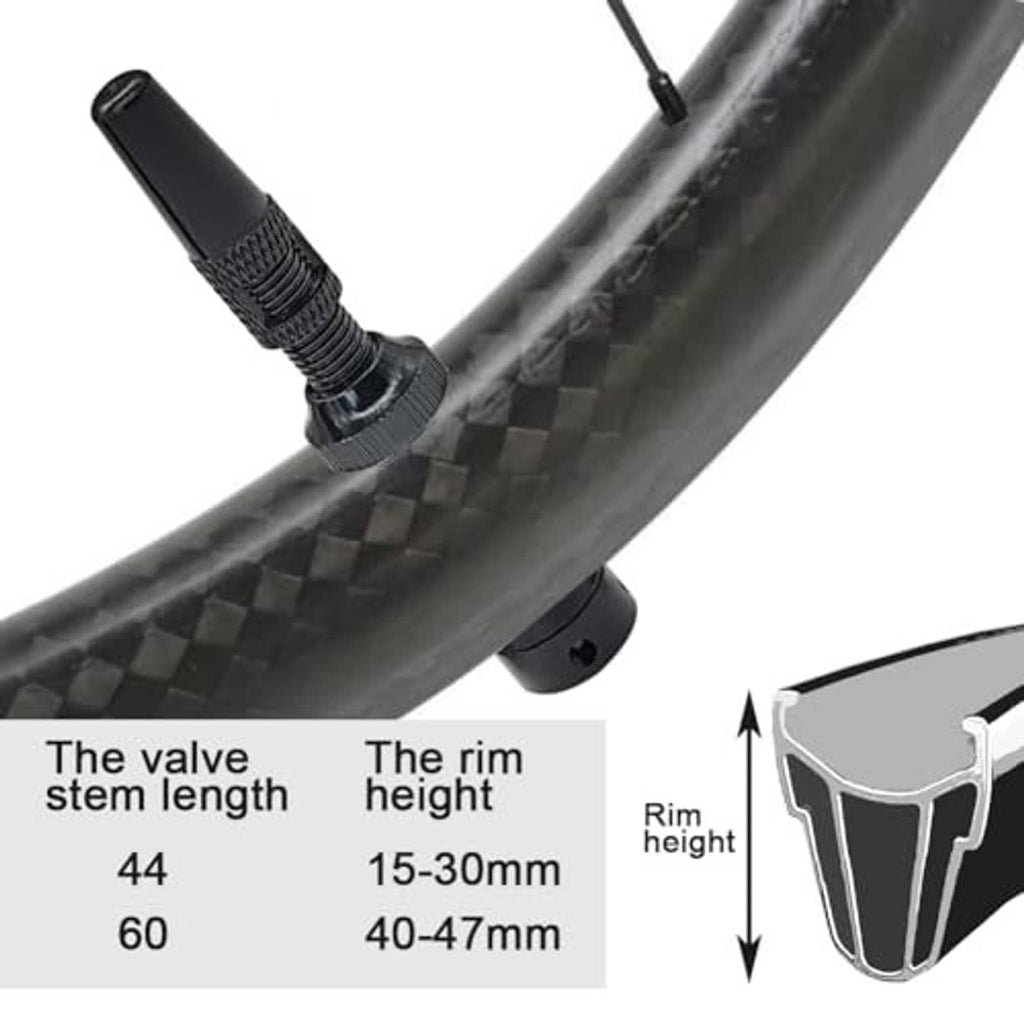 Black tubeless valve stem installed on a bicycle rim, side view with sizing