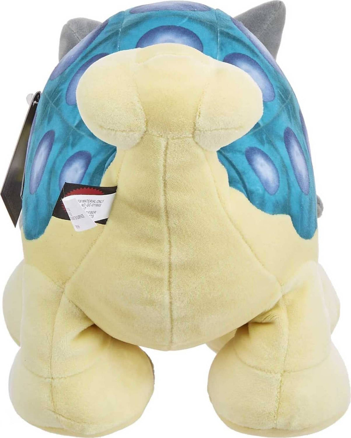 Yellow plush baby dinosaur backside with blue spot-covered head and gray ear tips