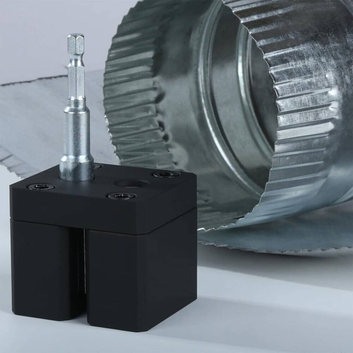 Black crimper attachment against ribbed metal sheet for powered crimping