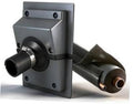 Gray wall penetration cover with black pipe opening and insulated line boots