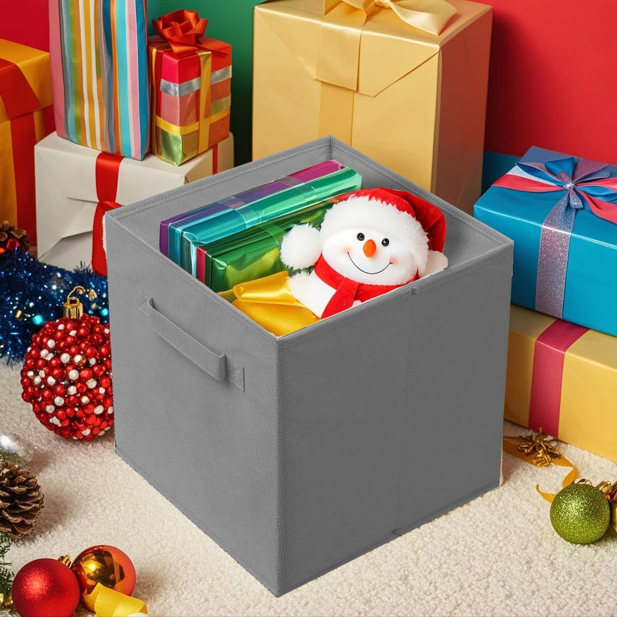 Gray foldable fabric storage cube with handle holding plush toy and gifts
