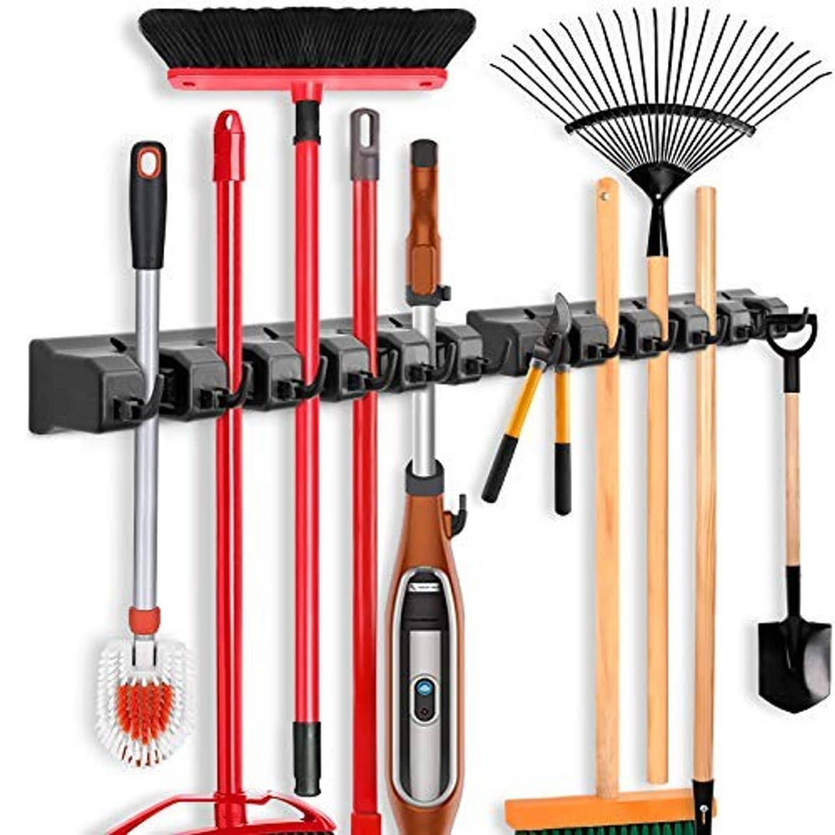 Wall-mounted mop and broom holder rack with multiple hooks holding brooms and mops