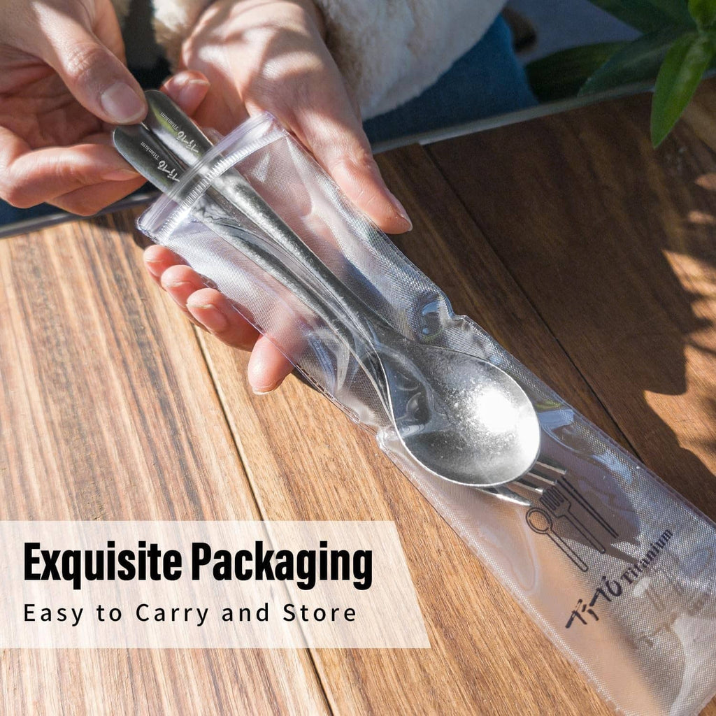 Silver titanium spoon and fork in a clear protective packaging sleeve