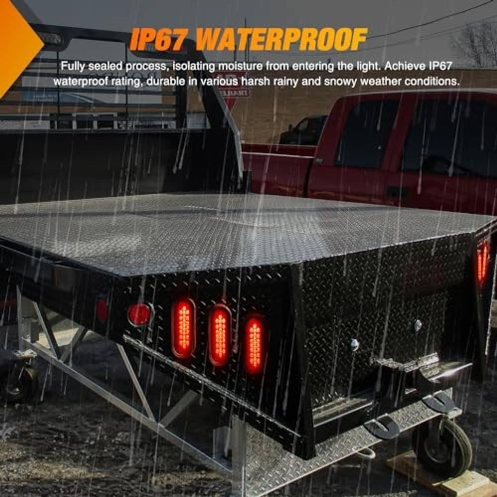 Four oval red 24-LED trailer tail lights glowing, waterproof sealed light housings