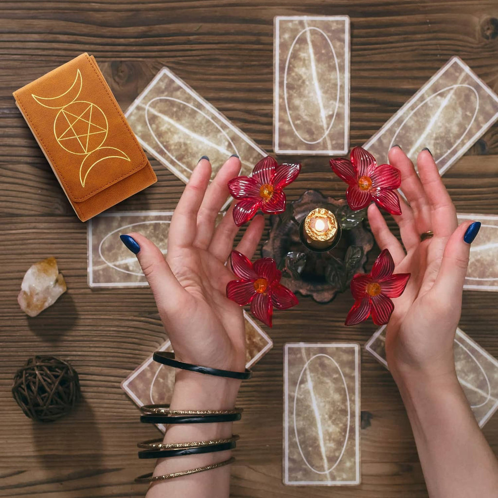 Orange-brown tarot card case with gold pentacle and crescent symbol