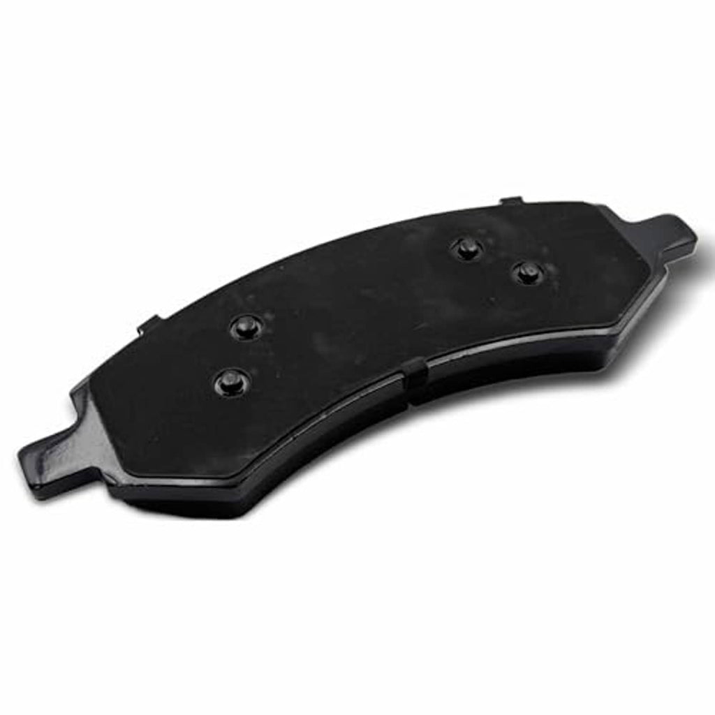 Ceramic brake pad, black backing with three circular wear holes and mounting tabs