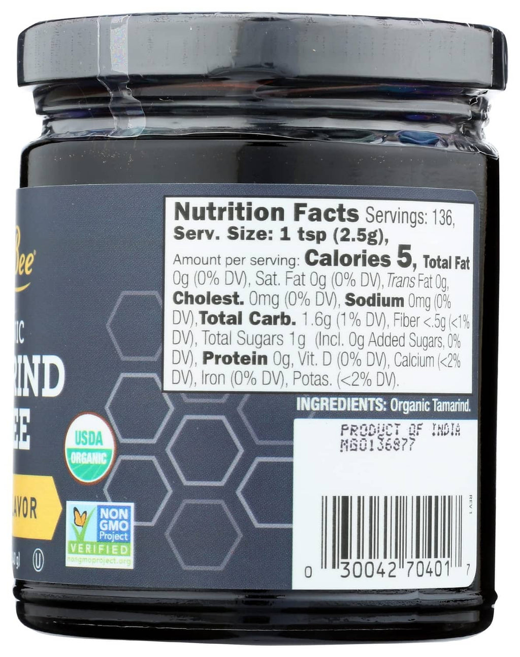Nutrition facts and ingredient label on organic tamarind puree jar back, with barcode
