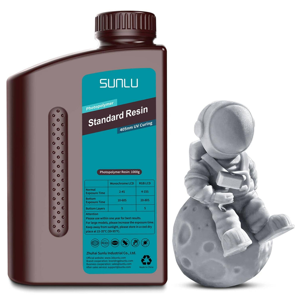 3D printer resin bottle with label and miniature astronaut figurine, dark brown