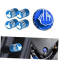 Blue tire valve cap set of four with white hand emblem, plus round cap top