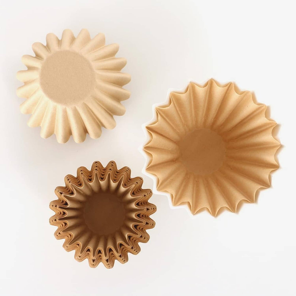 Assorted natural coffee filter baskets with pleated, fluted paper cups